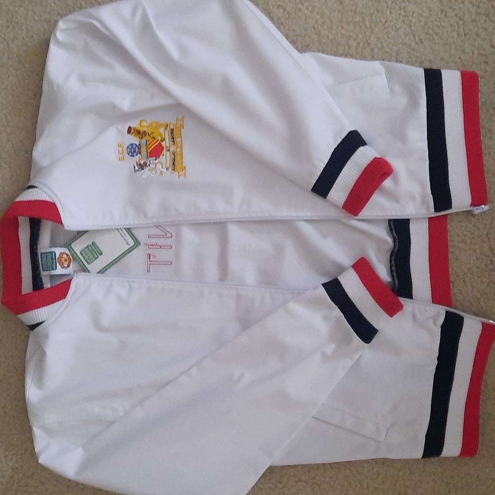 This is a new never worn Score Draw retro remake of an Manchester United  zip up